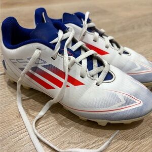 adidas White Kids Soccer Cleats with Blue Interior and Red Stripes